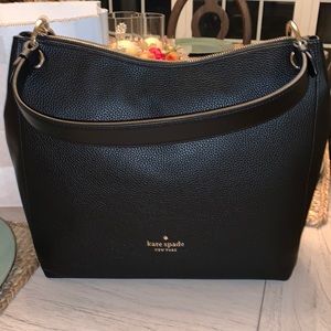 I’m selling a brand new with tags Kate spade bag